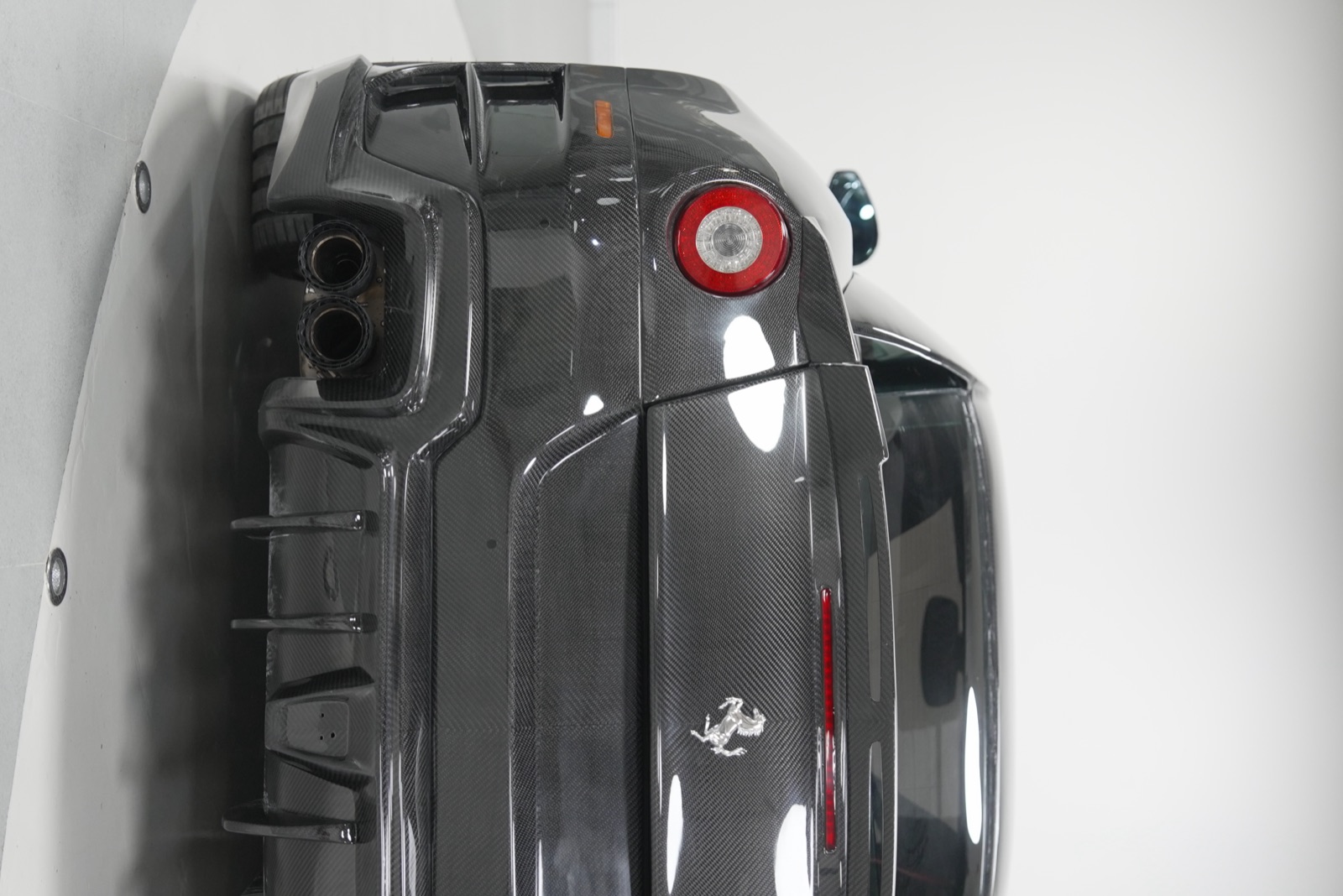 599 RF, rear three-quarter, exposed carbon fibre
