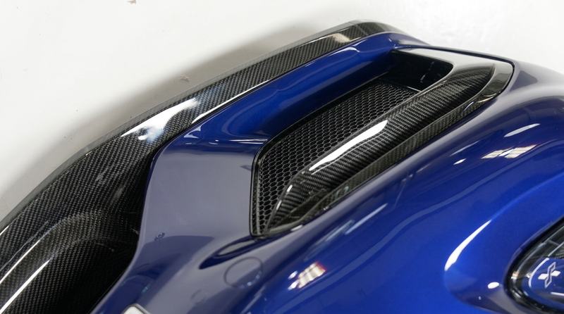 Moulded carbon exterior panel