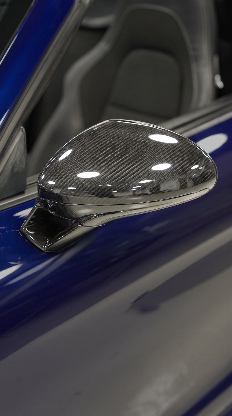 Glossy protective coating on a carbon surface